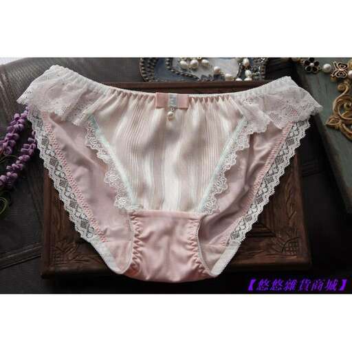 pink and white shorts with lace trim.