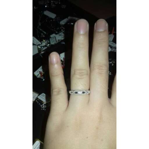 a close up of the ring on the left hand.