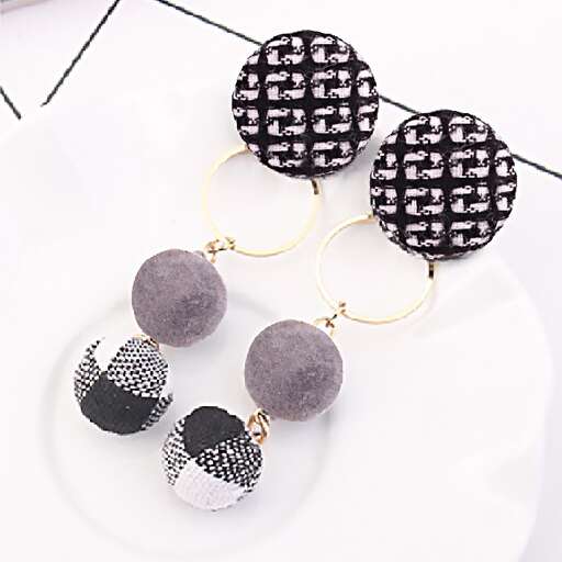 black and white polka dot earrings with black and white polka dots and a touch of silver