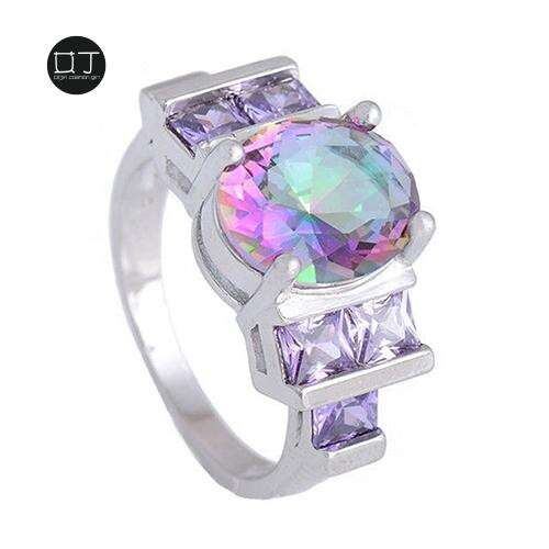 a ring with a large sapphire and diamonds.