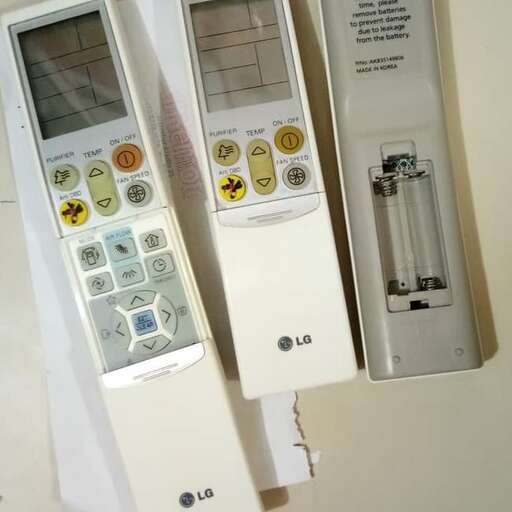 a white phone with a battery attached to it.