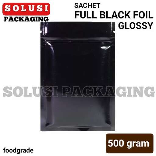 black plastic container with black plastic bag in the back
