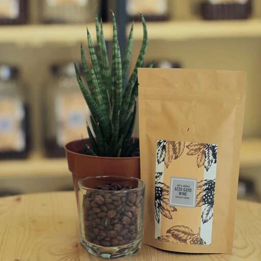 a cup of coffee and a plant