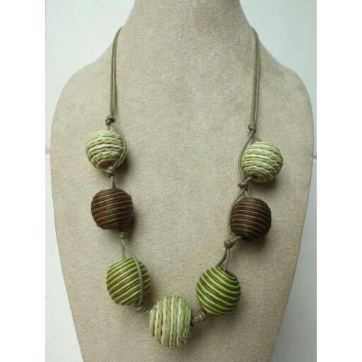 a pair of green glass beads.