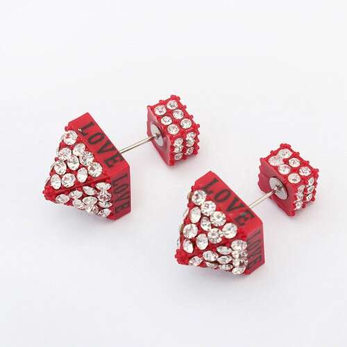 red dice with white flowers on a wire