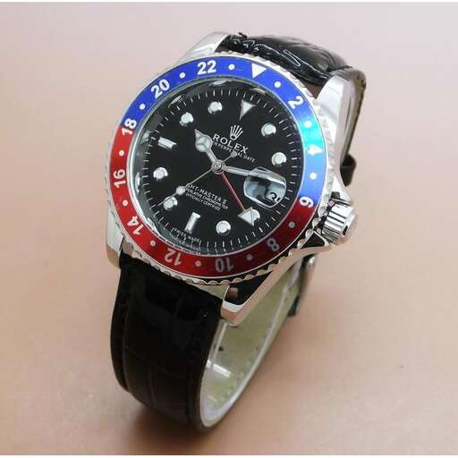 a watch with a red, white and blue face.