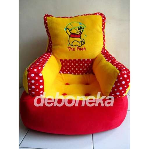 a red and yellow bed for children