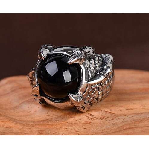 black opal set in sterling silver with a black opal and silver ring.