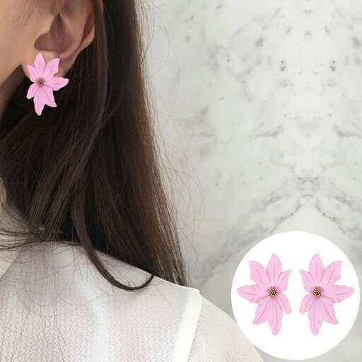 these earrings are made with real flowers.