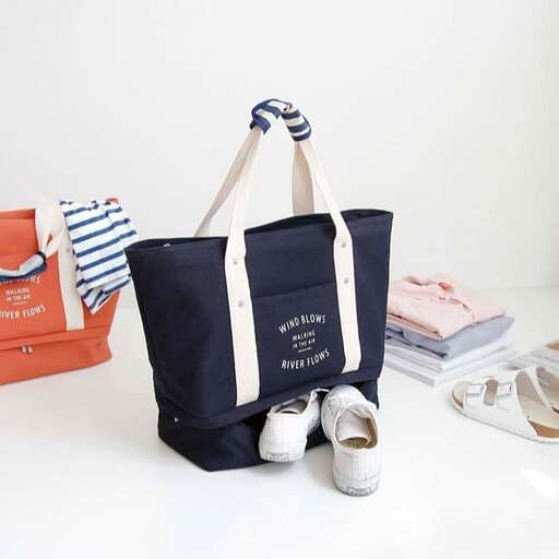 a bag with a beach bag on top of it.