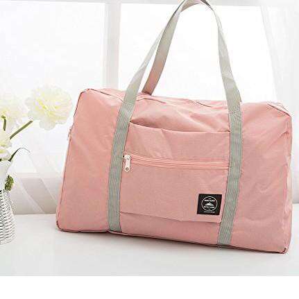 the bag is made from soft pink cotton.