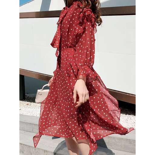 a red polka dot dress with polka dots