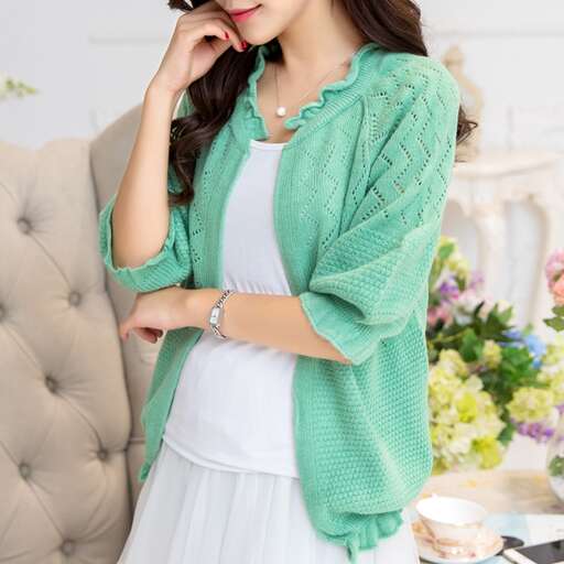 women in a green sweater