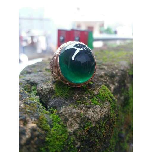 a ring made of a green opal