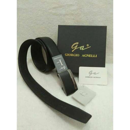 a black strap with a white card and a black card.