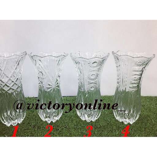 a set of wine glasses in a row.