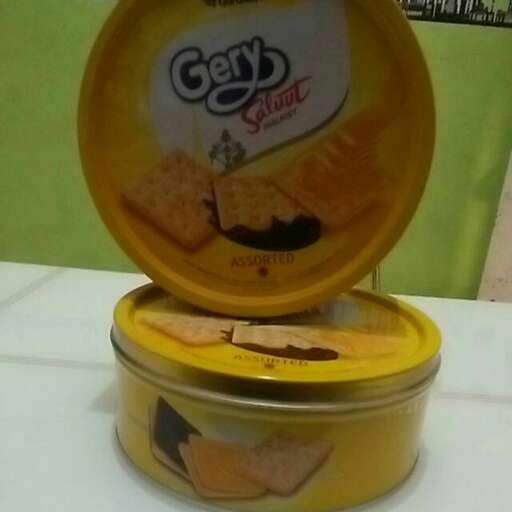 a yellow container with a picture of a sandwich in it.