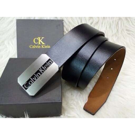 a pair of leather bracelets with a wooden buckle.