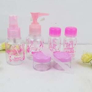 pink and white flowers in a bottle