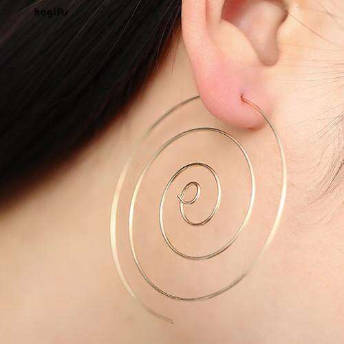 a hoop earring with a spiral in the middle.