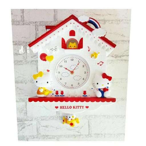 a clock with a picture of a little chicken house.