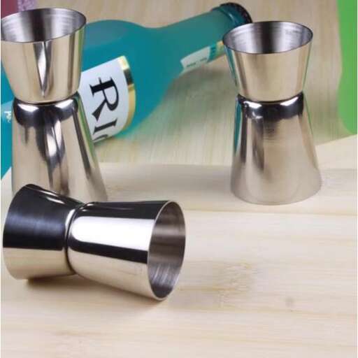 a pair of stainless steel cups with a black base.