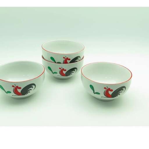 a red and green bowl with a bird design on the side.