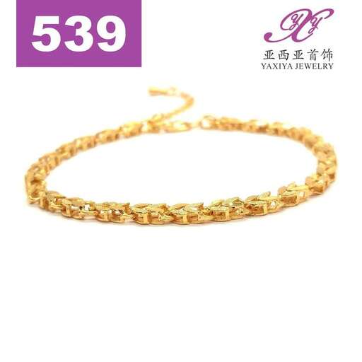 a gold bangle with a twist.