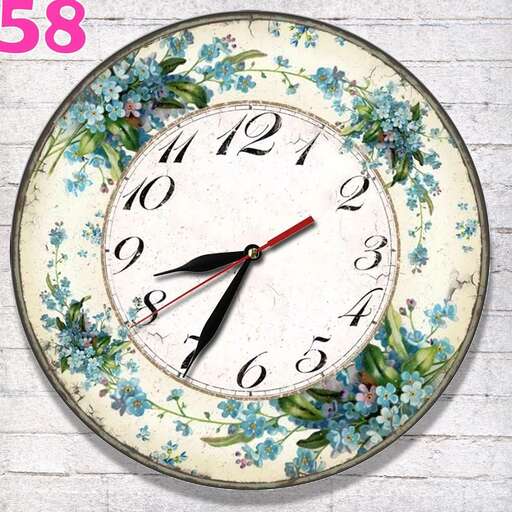a clock with a floral design on it.