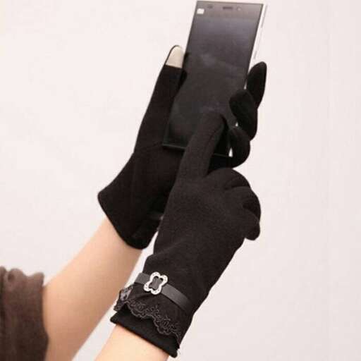 a person holding a cell phone in their hand.