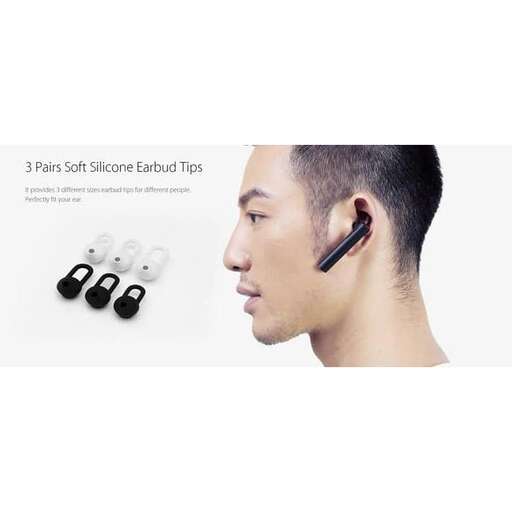 a man with a headset and earphones on his head.