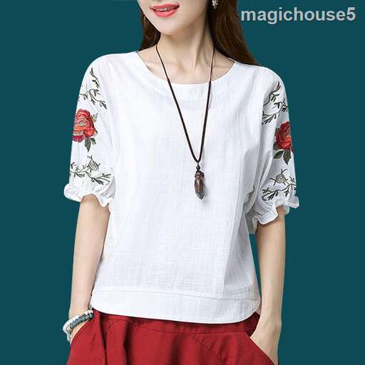 white blouse with a floral print