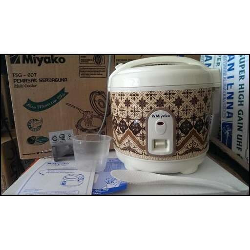 a coffee pot sitting on top of a table.