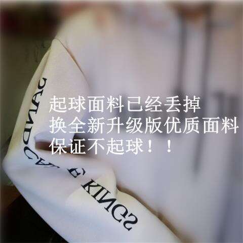 a person holding a piece of paper with writing on it.