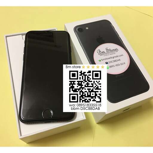 a black iphone in a white box with a black screen.