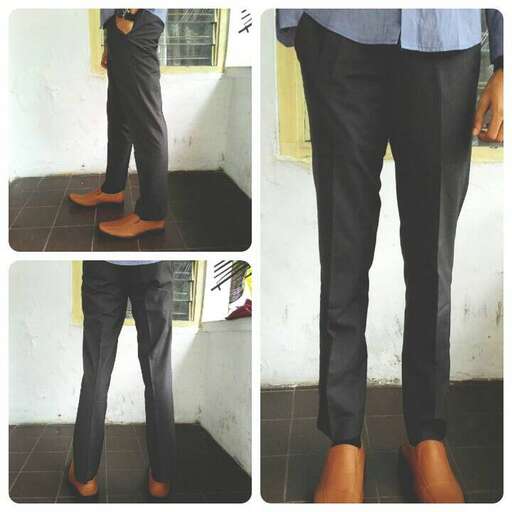 a pair of men's pants with a shirt and tie.