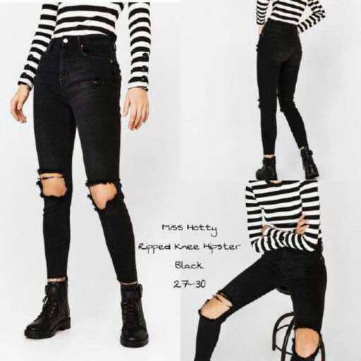 i love the black and white stripes on the bottom of the sweater.