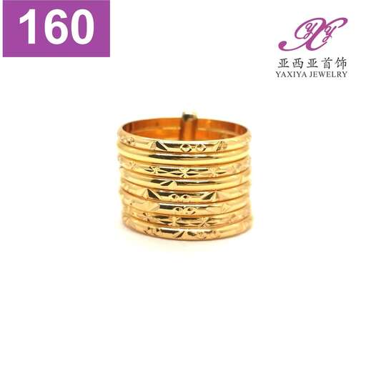 gold bracelet with a stack of coins