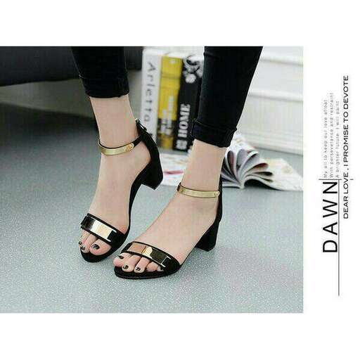 black high heeled sandals with a gold belt