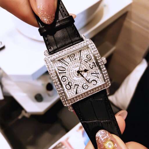 a watch with a diamond