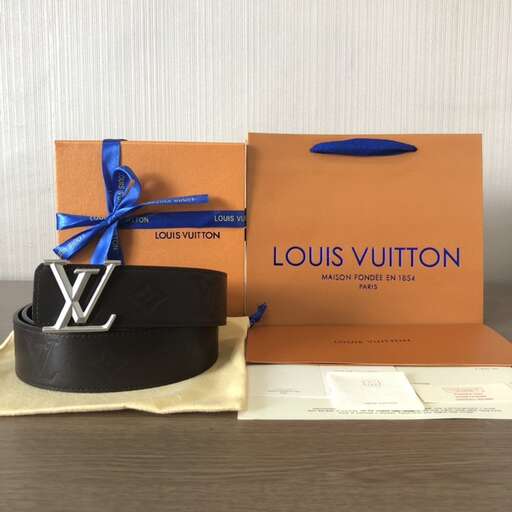 a black hat with a blue ribbon