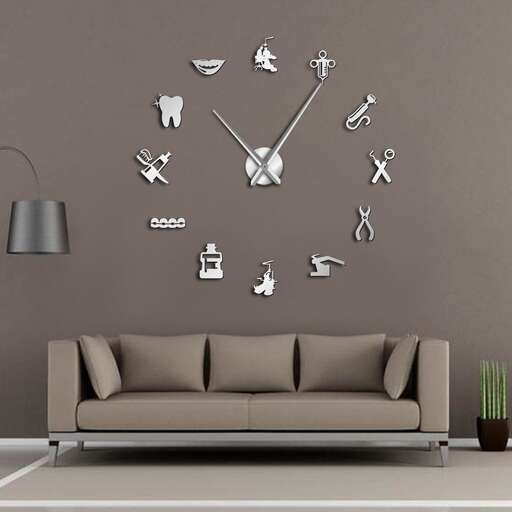 a wall clock with different types of tools