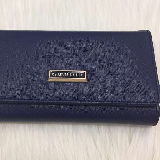 wallet with a black leather lining