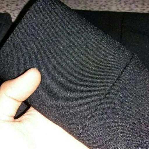 the cuff of the suit is folded.