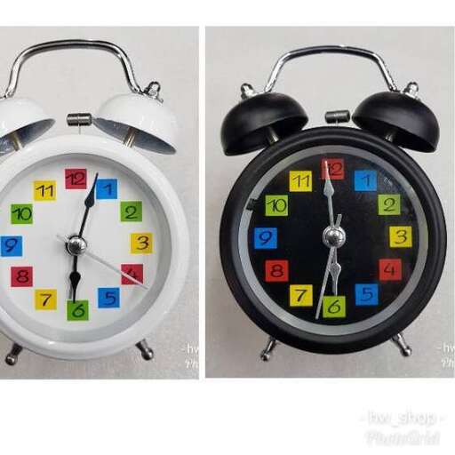 a clock with different colors and shapes.