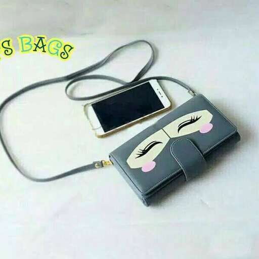 a cell phone with a mouse pad attached to it.
