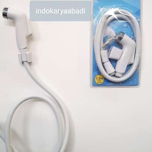 a white cord and a white cord on a wall.