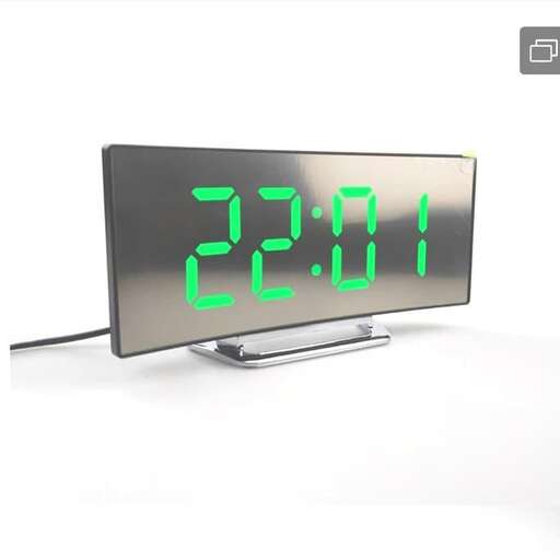 a digital clock with green numbers showing the time.