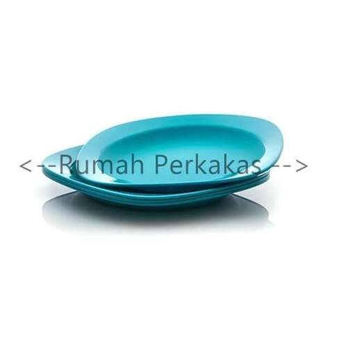 a blue plate with a spoon on it