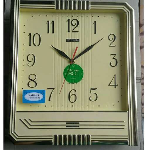 a close up of a clock on a wall